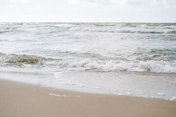 Fototapeta na wymiar Sand beach on Baltic sea in a storm