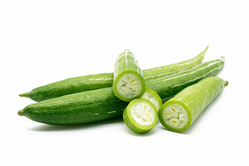 whole and slices fresh Snake gourd isolated on white background