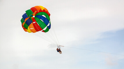 Male, Maldives, 09.10.21
Active entertainment on vacation. Parasailing in the Maldives. Parachute flight