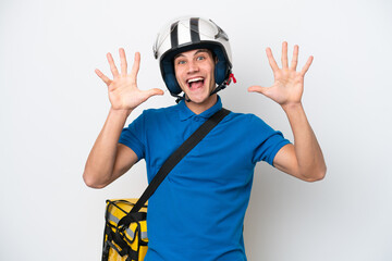 Young caucasian man with thermal backpack isolated on white background counting ten with fingers