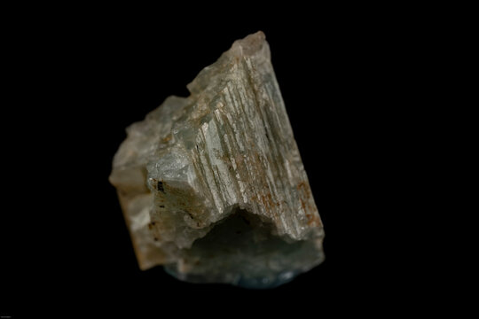 A Piece Of Beryl Crystal On Black Background