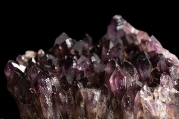 amethyst crystals on a black background