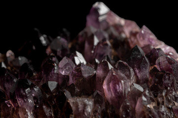amethyst crystals on a black background