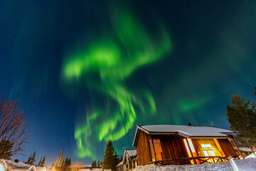 Northern Lights in Lapland. in Abisko in Sweden. Colors in the sky and in the snow