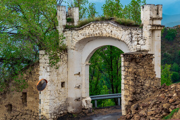 Naklejka premium ancient gate in the medieval fortress 