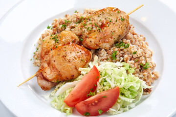 chicken kebab with buckwheat and salad