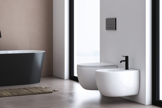 Corner of modern bathroom with white and beige walls, concrete floor, comfortable bathtub, toilet and bidet .3d rendering
