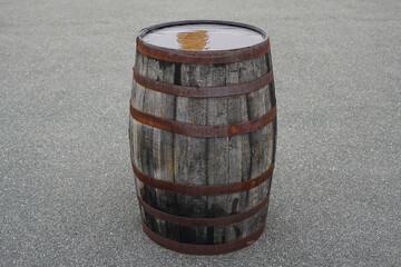 Old wooden whisky barrel in a distillery in Scotland