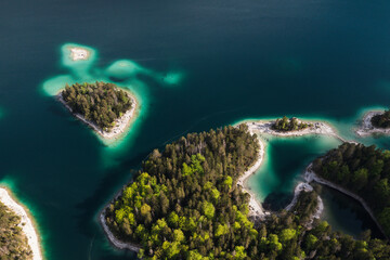 Wonderful Eibsee in Bavaria at the German Alps from above - aerial view