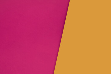 Dark vs light abstract Background with plain subtle smooth de saturated pink yellow  colours parted into two