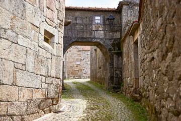 Fototapeta na wymiar Salto (Portugal), June 24, 2022. Typical street. The village of Salto is the largest in the municipality of Montalegre. It appears cited in documents from the 6th century.