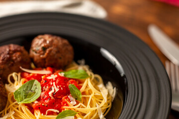 Meatballs with spaghetti in sugo sauce