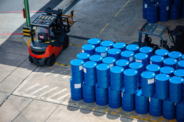 Top view oil barrels forklift truck move for on the transportation worker help