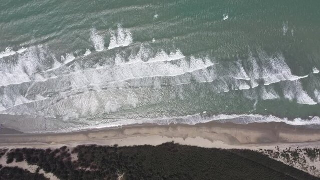 Top Down Aerial View of Sea Waves on The Beach in Cox's Bazar, Bangladesh