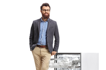 Bearded man leaning on an open dishwasher