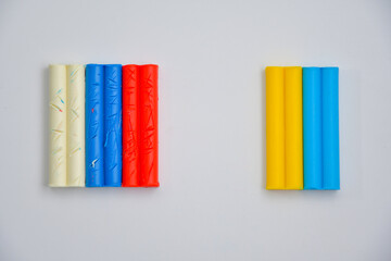 Ukrainian and Russian flag made of plasticine blocks