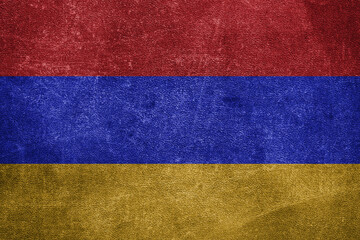 Old leather shabby background in colors of national flag. Armenia