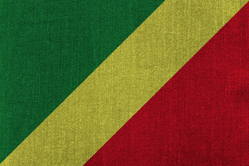 Patriotic classic denim background in colors of national flag. Congo