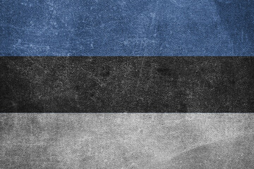Old leather shabby background in colors of national flag. Estonia