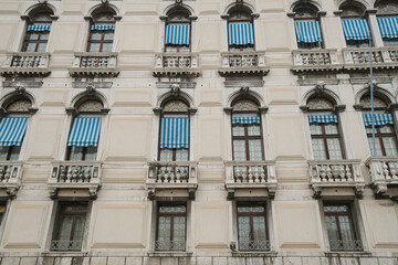 Traditional gothic windows facade in old Venice city center building,Italian Architectural landmarks