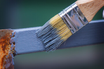 paint the iron frame with gray paint.