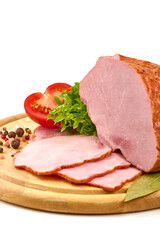 Smoked pork loin on a cutting board with condiments
