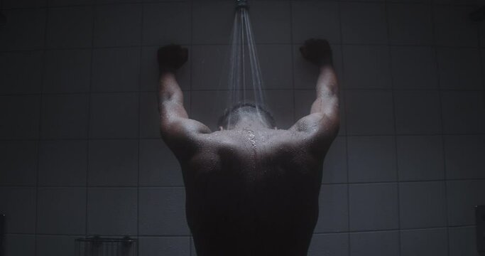 Young Black Male Taking A Shower.