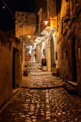 An empty picturesque alleyway in downtown Matera, Italy