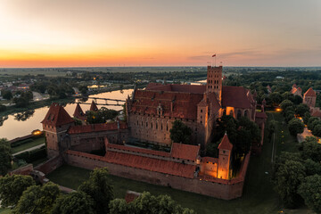 Fototapeta na wymiar Evening panorama of the castle in Malbork from a height