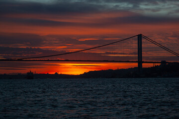 Fototapeta na wymiar Sunset in the 15 July Martyrs Bridge , Uskudar Istanbul Turkey