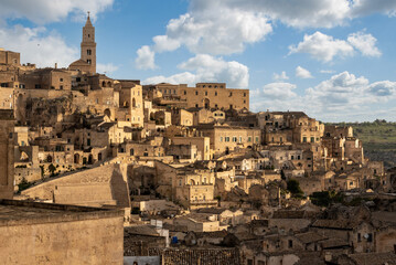 Fototapeta na wymiar Magnificent skyline of historic Matera with the cathedral and cave church of Saint Mary of Idris, Southern Italy