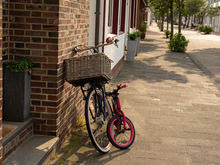 Bicycle with a wicker basket.
