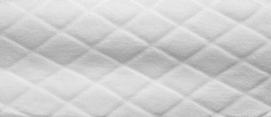 Soft white texture of a terry towel or bathrobe. Background, texture