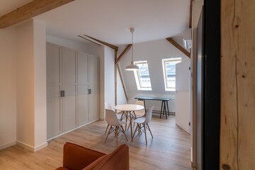 Salmon-colored sofa in a modern living room in an apartment