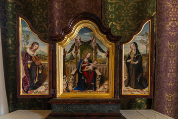 Fototapeta na wymiar triptych of religious saints on the armoire in the Queen's Inner Hall inside the Stirling Castle