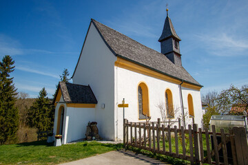 Fototapeta na wymiar View of Bavaria spring countryside rural scene - Pilgrimage church of Wilparting, Irschenberg village, Upper Bavaria, Germany