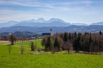 View of Bavaria spring countryside rural scene - Pilgrimage church of Wilparting, Irschenberg village, Upper Bavaria, Germany