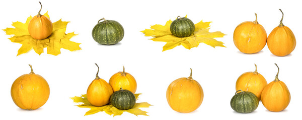 Bright ripe pumpkins and autumn leaves