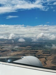 Fototapeta na wymiar View from airplane on a beautiful landscape