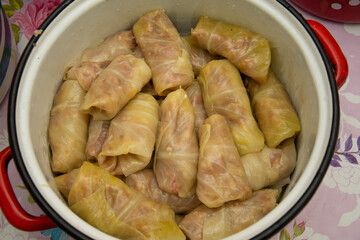 how to make sarmales step by step, Sarmale, traditional Romanian food, rice in pickled cabbage leaves,