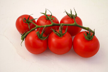 red tomatoes on a vine