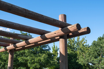 Pergola made with natural wood material in the city park