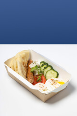 Pitta with sausage and vegetables