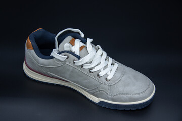 new gray  sneakers sport shoe , stitching detail on sport shoes