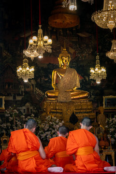 monks in temple in thailand