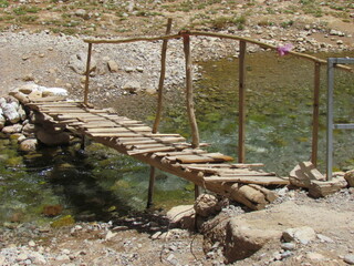wooden bridge over the river