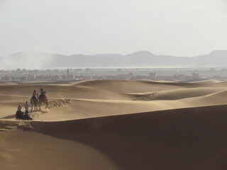 people walking on the desert