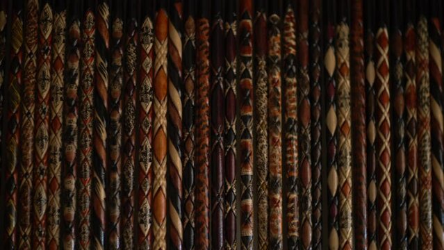 video shots of walking sticks in the area where handmade canes are exhibited