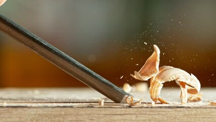 Super slow motion of detail of carving wood with a chisel. Low depth of focus, super macro shot. Filmed on high speed cinema camera, 1000 fps. - Powered by Adobe