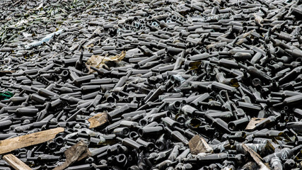 A mountain of broken bottles after a shell hit. The concept of destruction of property during the war